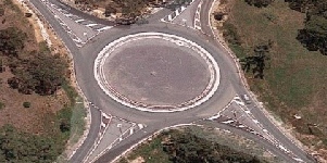 Four-way exit roundabout with channelised turn lanes