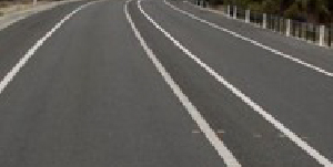 Sealed road with 1-metre shoulders with wide, centre median line treatments.